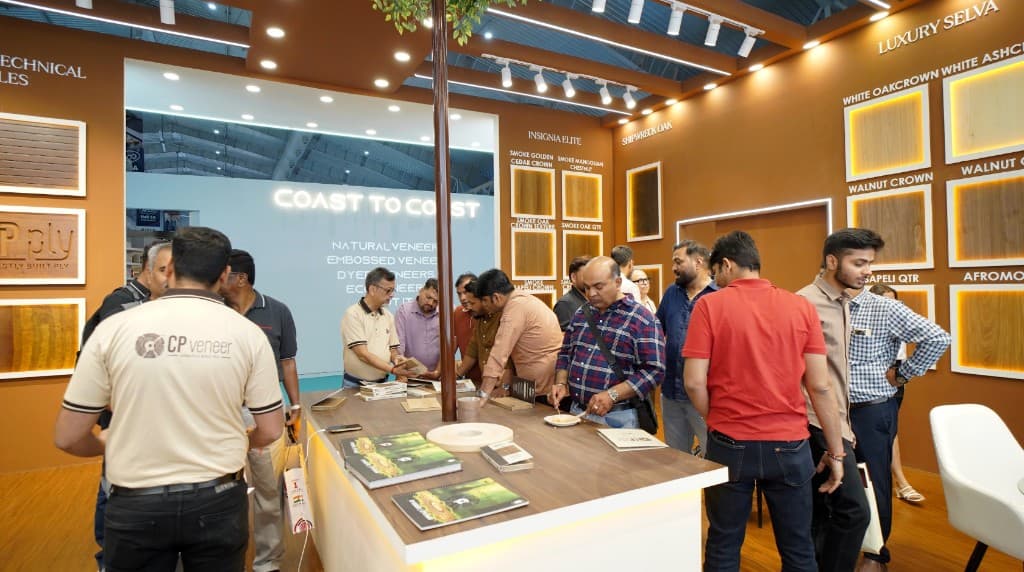 Visitors exploring CP Veneers and plywood at the busy exhibition booth